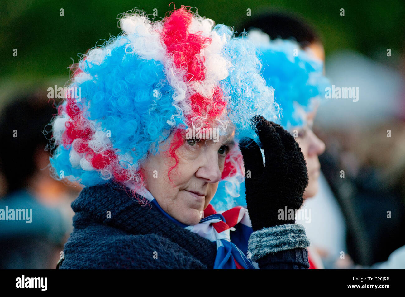 Reveler frequentando il diamante della regina festeggiamenti giubilari in Hyde Park, Londra 2012 Foto Stock