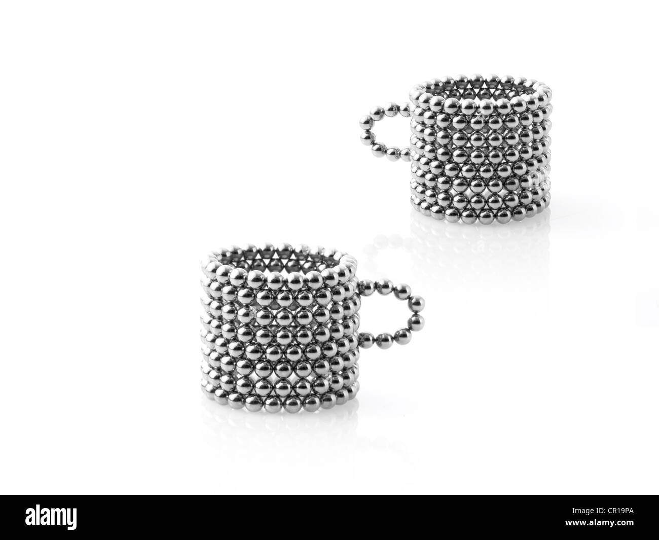 Studio shot di Pachinko sfere disposte in tazza Foto Stock