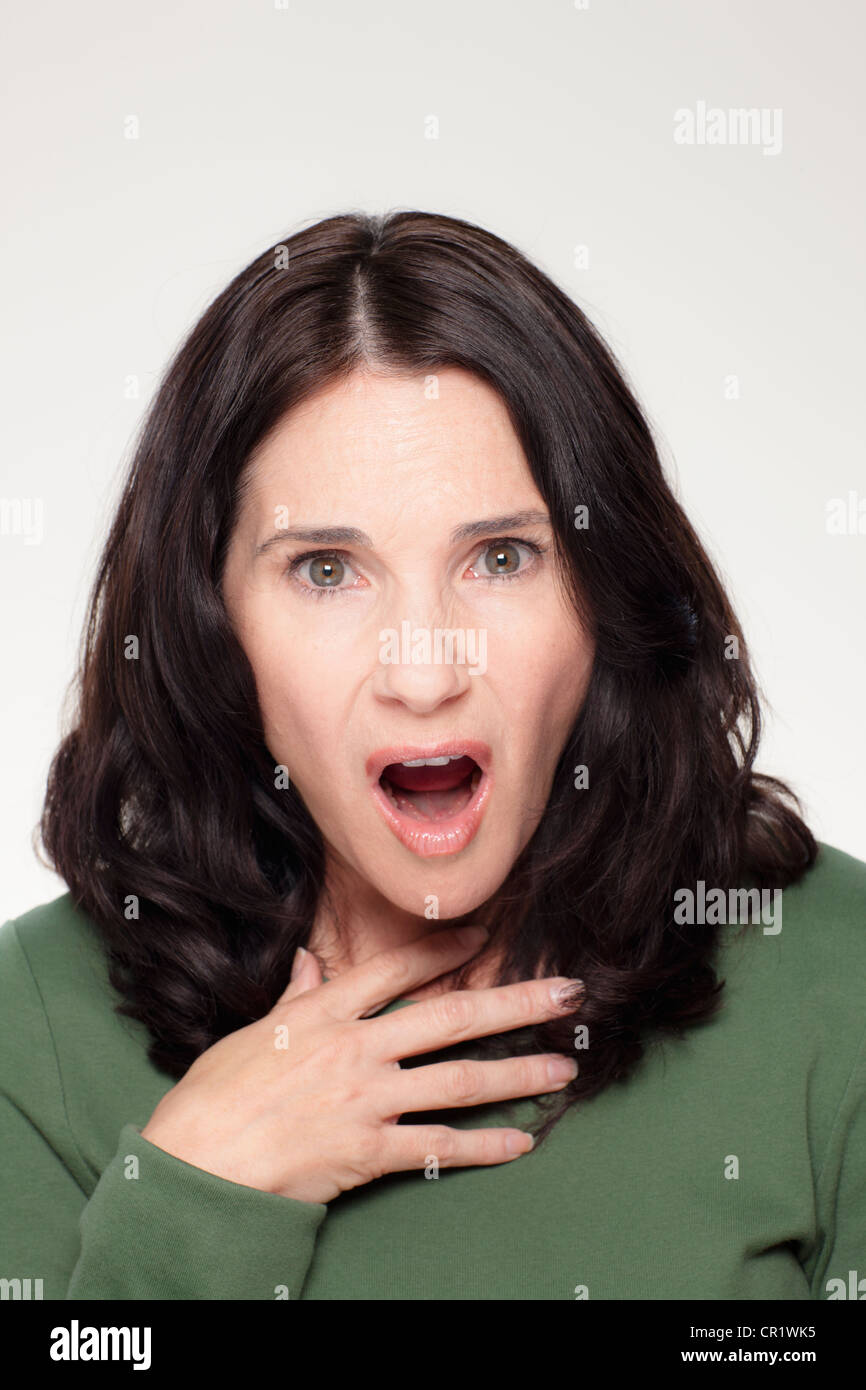 Studio ritratto di donna matura con espressione facciale Foto Stock