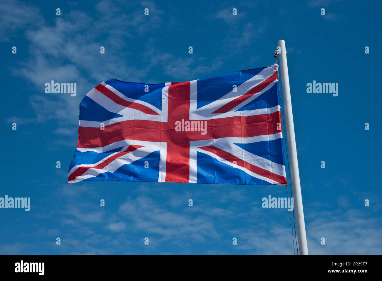 Unione battenti bandiera da un flag pole Foto Stock