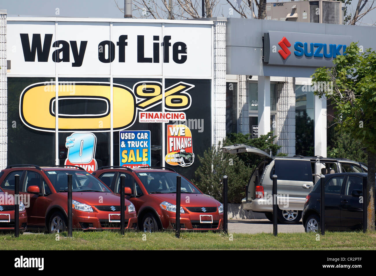 0% di finanziamento segno, di finanziamento dello zero percento segno, Suzuki concessionaria Foto Stock