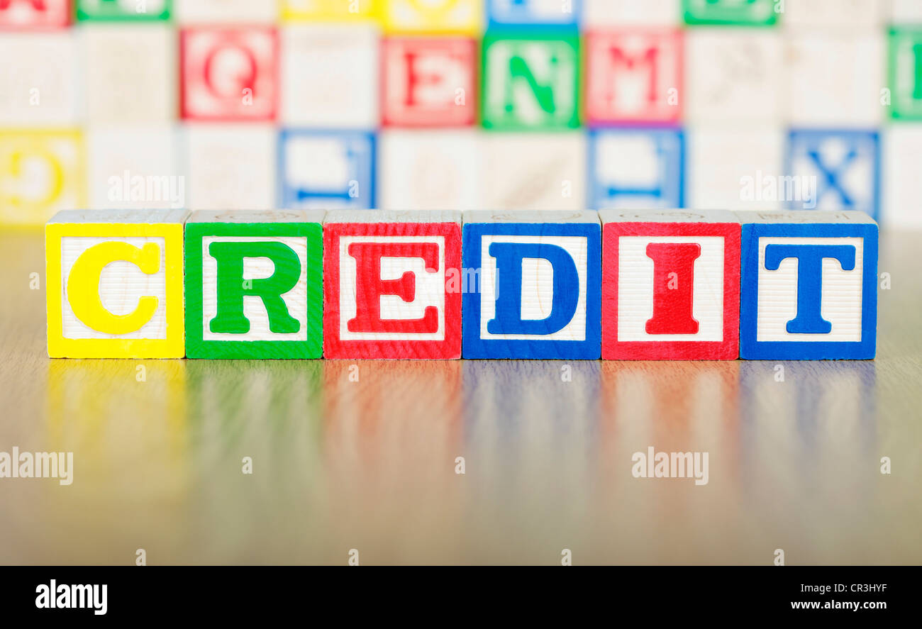 Il credito enunciato in alfabeto di blocchi di costruzione Foto Stock