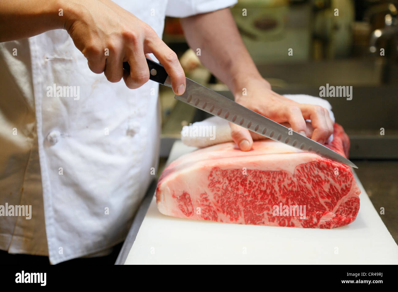 Chef grumo di taglio di carne Foto Stock