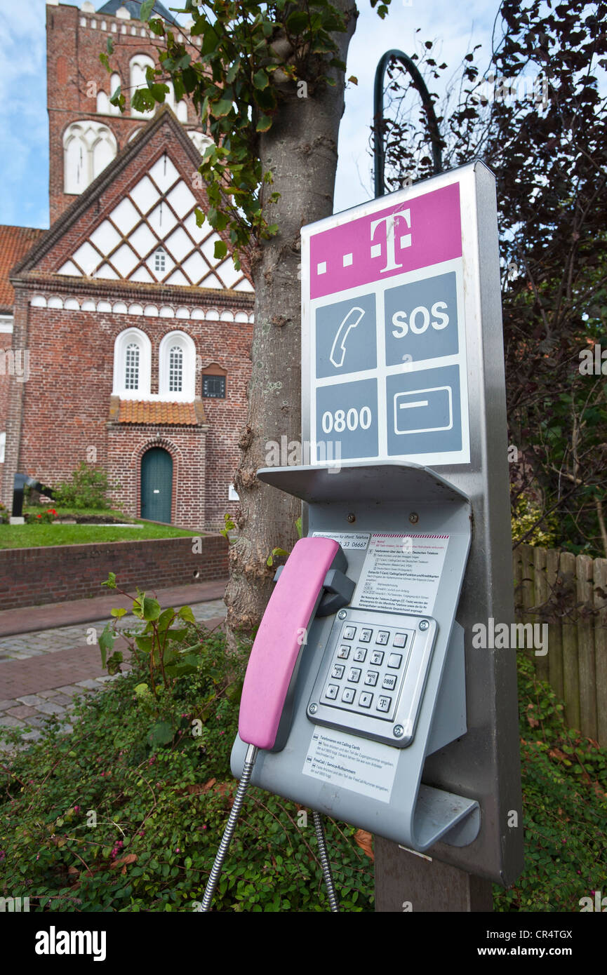 Telefono pubblico, Pilsum, Frisia orientale, Bassa Sassonia, Germania, Europa Foto Stock
