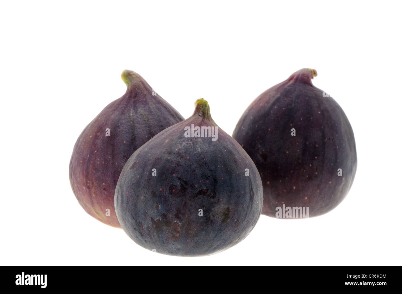 Tre fichi freschi - studio shot con uno sfondo bianco Foto Stock