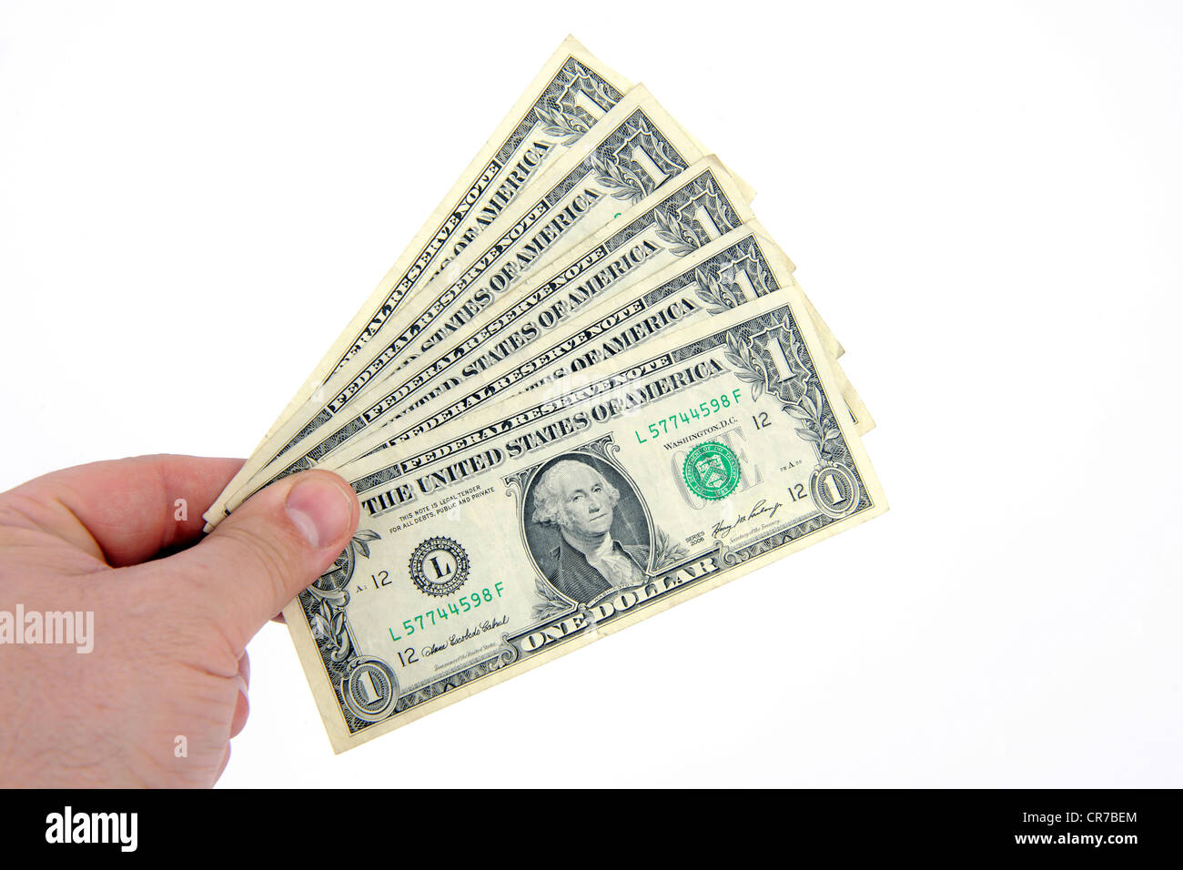 Una mano che tiene a 1 Dollaro Foto Stock