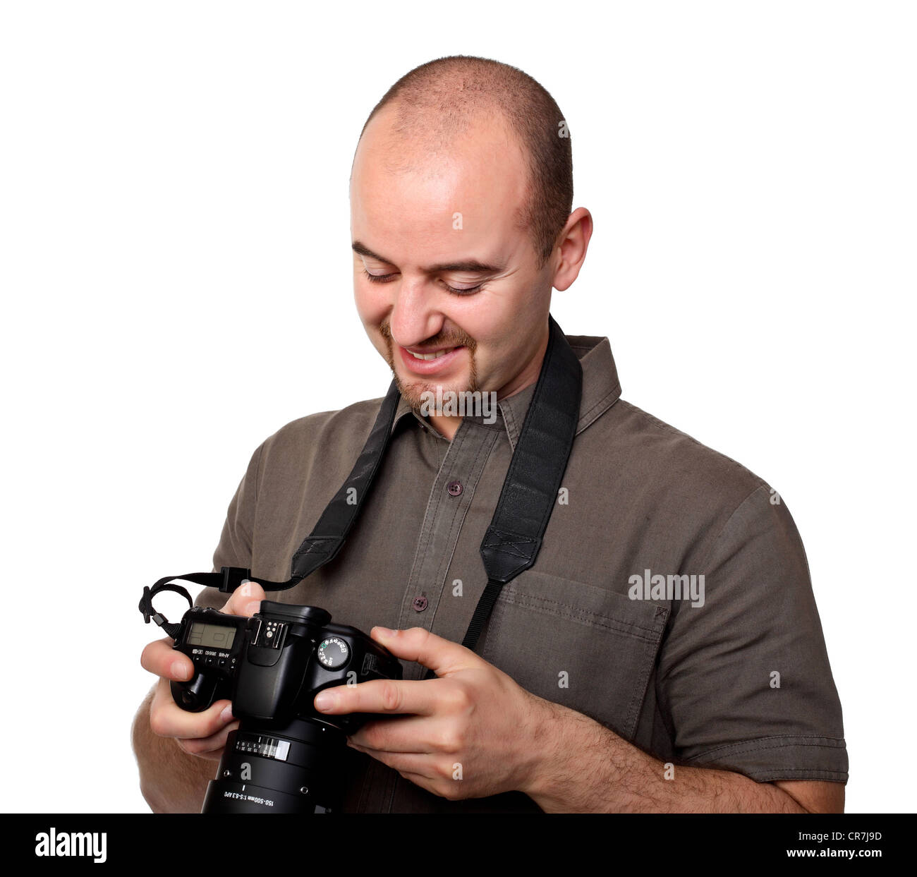 L'uomo cerca la sua telecamera isolato su bianco Foto Stock