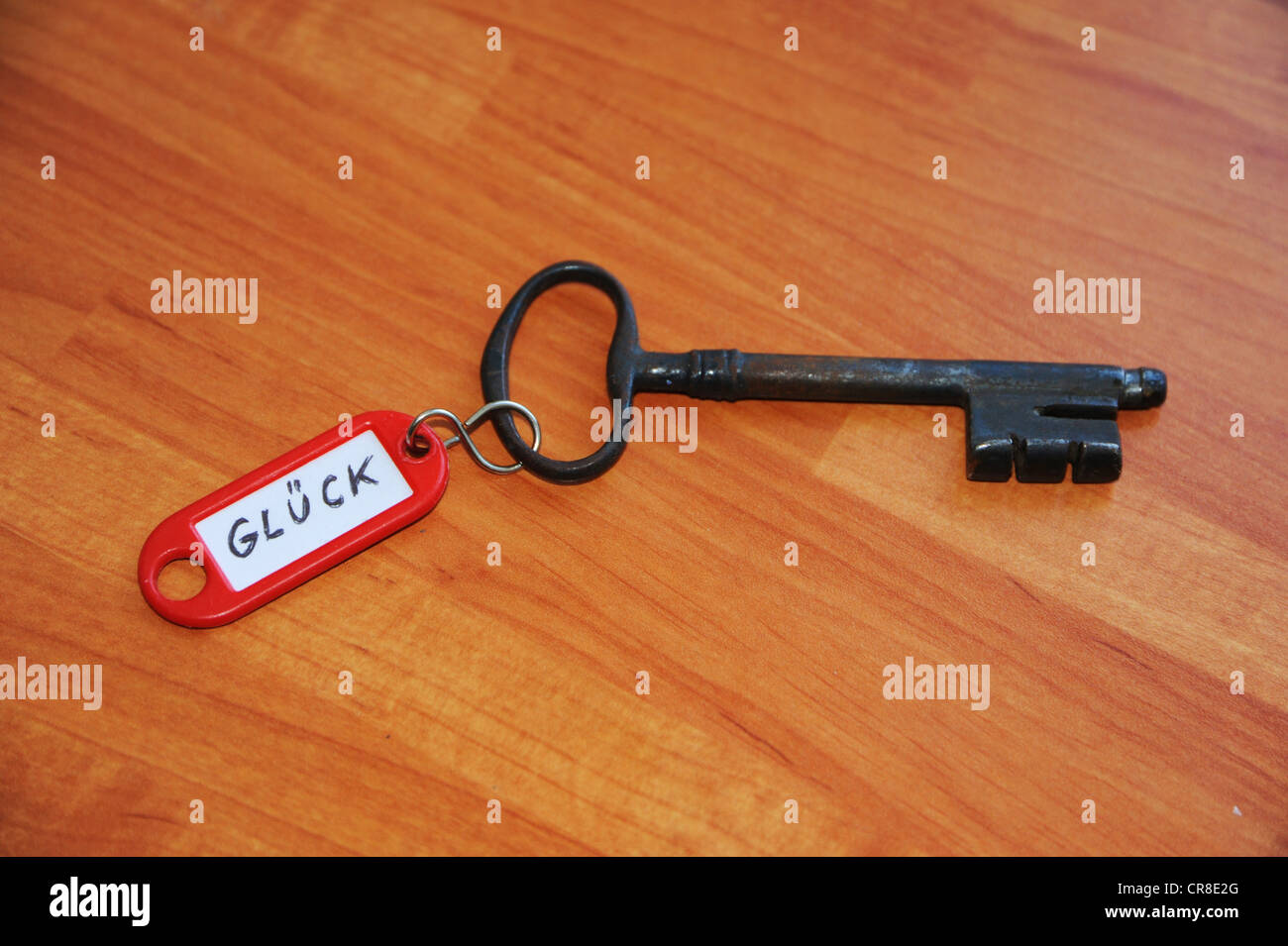 Anello chiave con il segno "Glueck', Tedesco per 'fortuna' immagine simbolica per 'chiave della felicità" Foto Stock