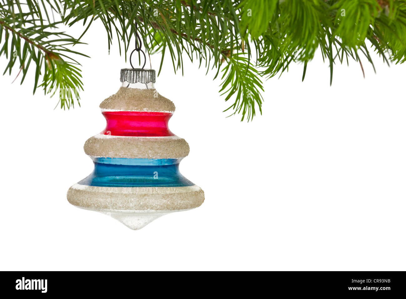 Vintage albero di natale ornamento e ramo sul bianco. Foto Stock