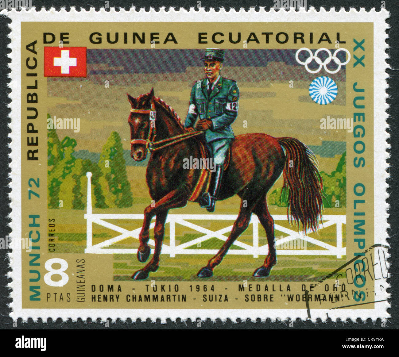 Un timbro stampato in Guinea equatoriale è dedicato ai giochi olimpici estivi di Monaco di Baviera-72, Show Jumping, circa 1972 Foto Stock