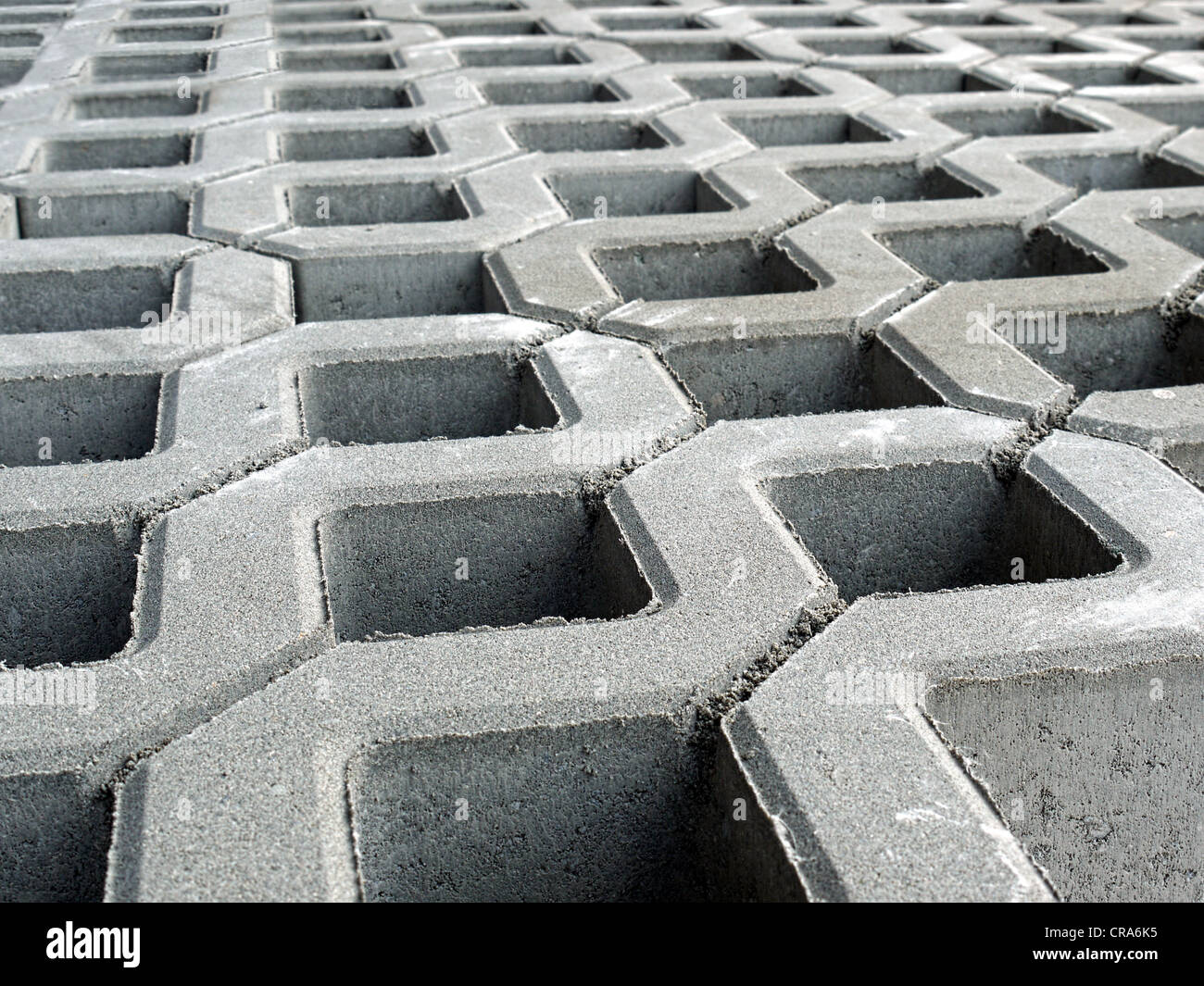 Primo piano di openwork pavimentazione in calcestruzzo Foto Stock