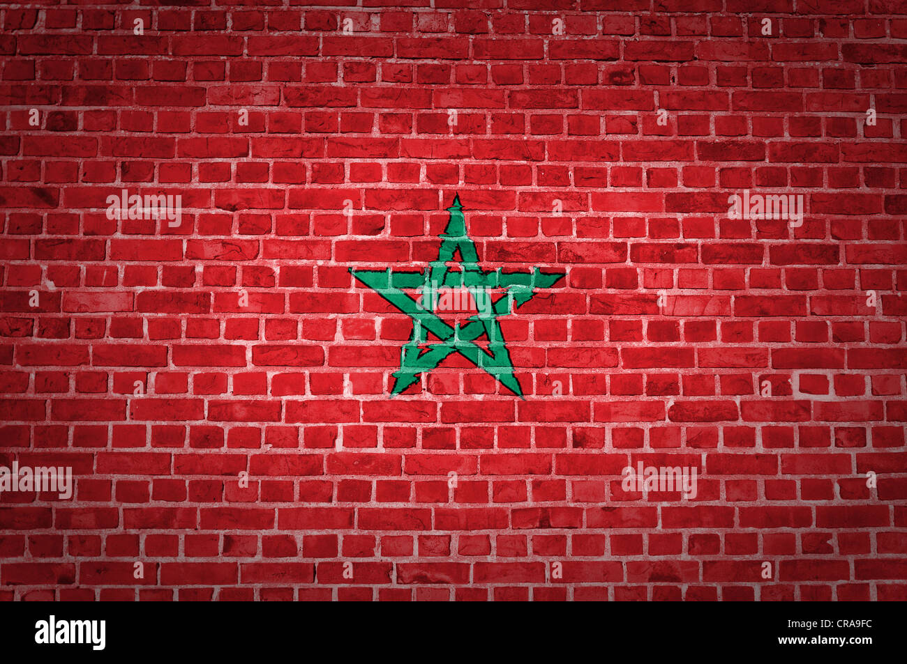 Un'immagine della bandiera del Marocco dipinta su un muro di mattoni in una collocazione urbana Foto Stock