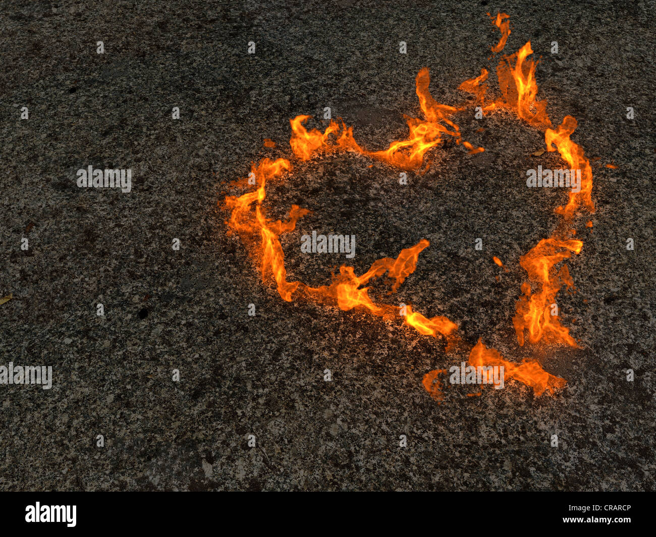 Fiamme formando un cuore Foto Stock