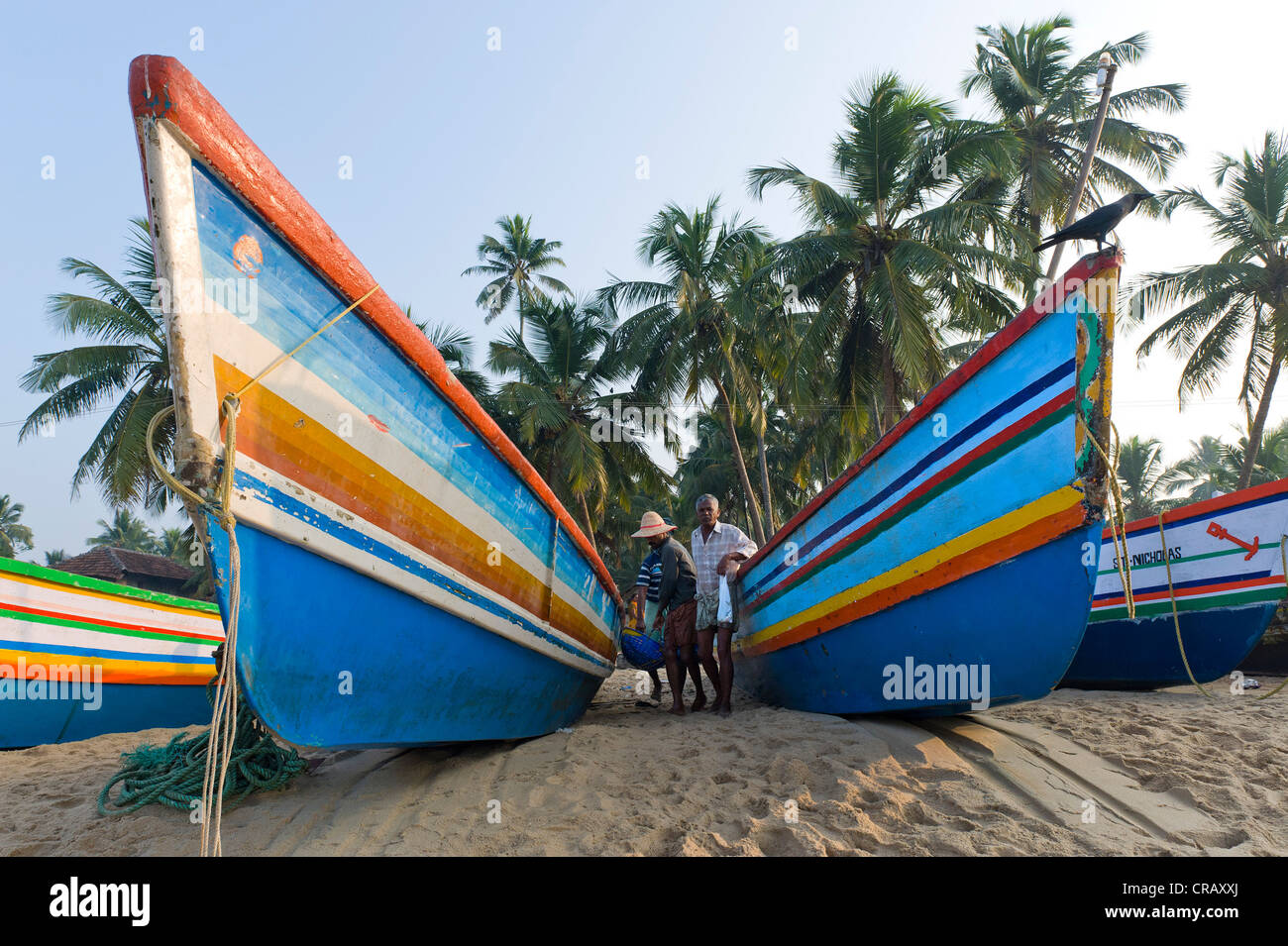 Barche da pesca su una spiaggia, Bekal, Nord Kerala, Kerala, India, Asia Foto Stock