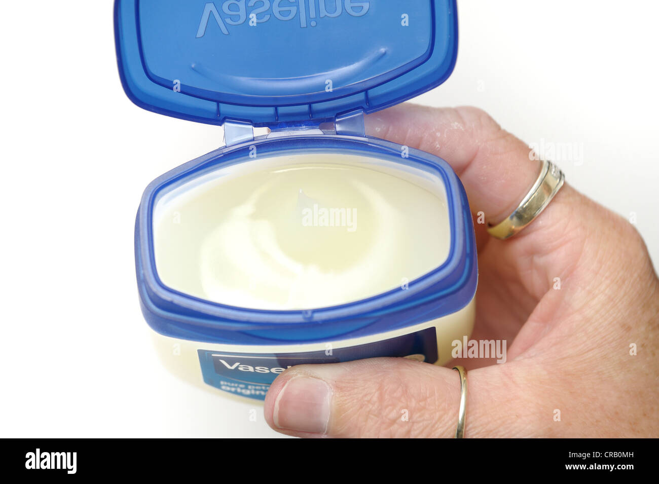 Un barattolo di vaselina con coperchio aperto Foto Stock