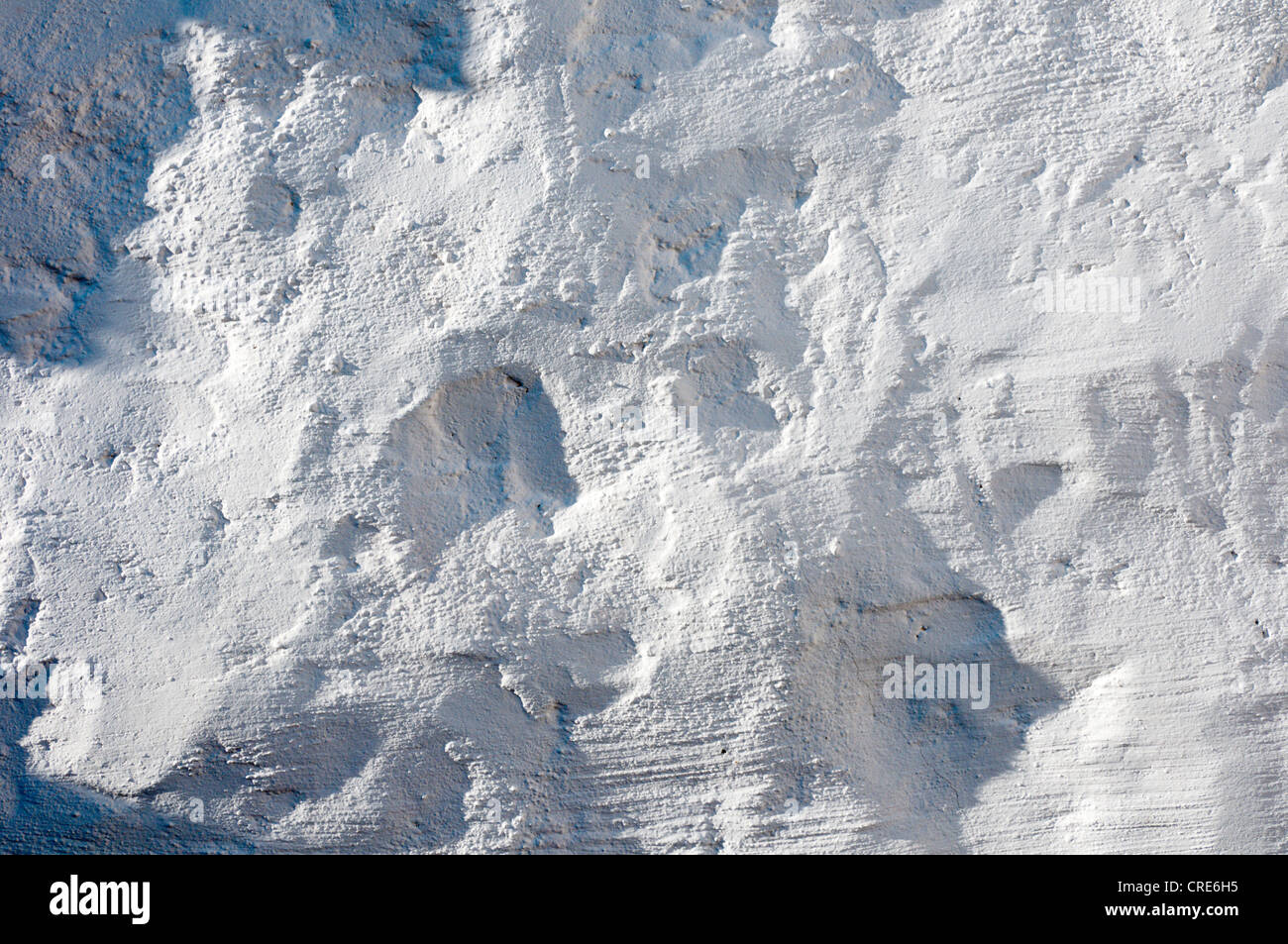 Tessitura grossolana di un bianco muro intonacato. Foto Stock