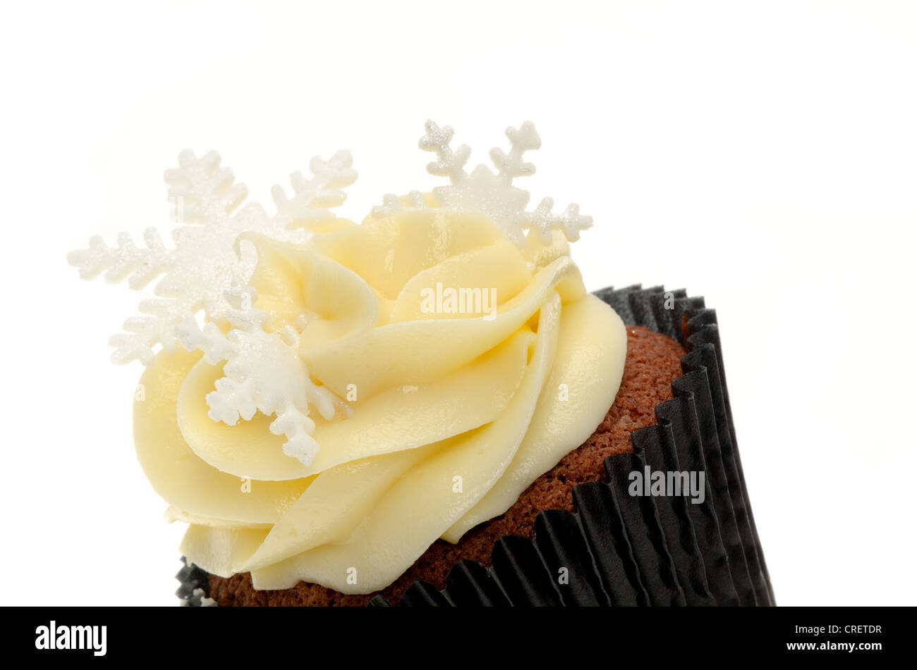 Crema di burro di Natale e ghiacciolo cupcake - studio shot con uno sfondo bianco Foto Stock