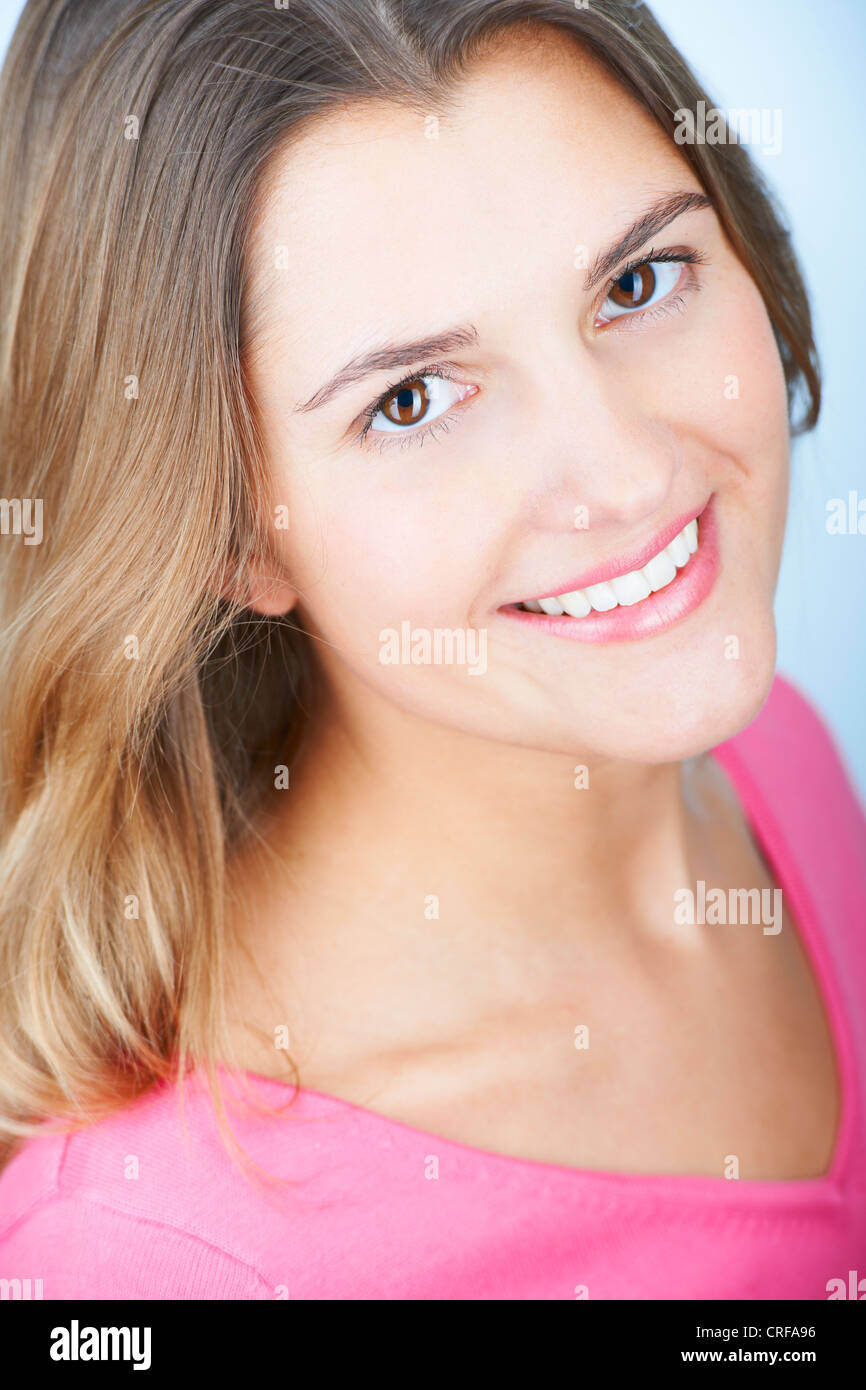 Close up dei womans volto sorridente Foto Stock
