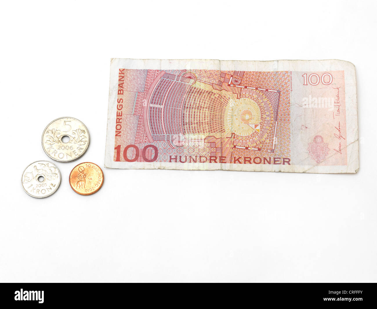Corone norvegesi di banconote e monete - Ore, 1 krone, 5 Krone e 100 kroner nota mostra Folketeateret in Oslo Concert Hall Foto Stock