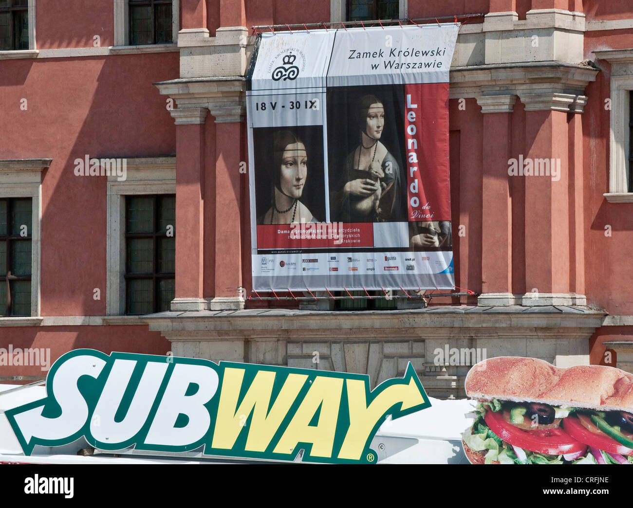 La metropolitana il fast food pubblicità segno e Leonardo da Vinci dipinto della Dama con l'ermellino al Castello Reale di Varsavia, Polonia Foto Stock