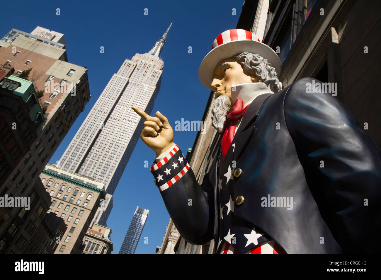 Lo zio Sam punti nella direzione di Empire State Building Foto Stock