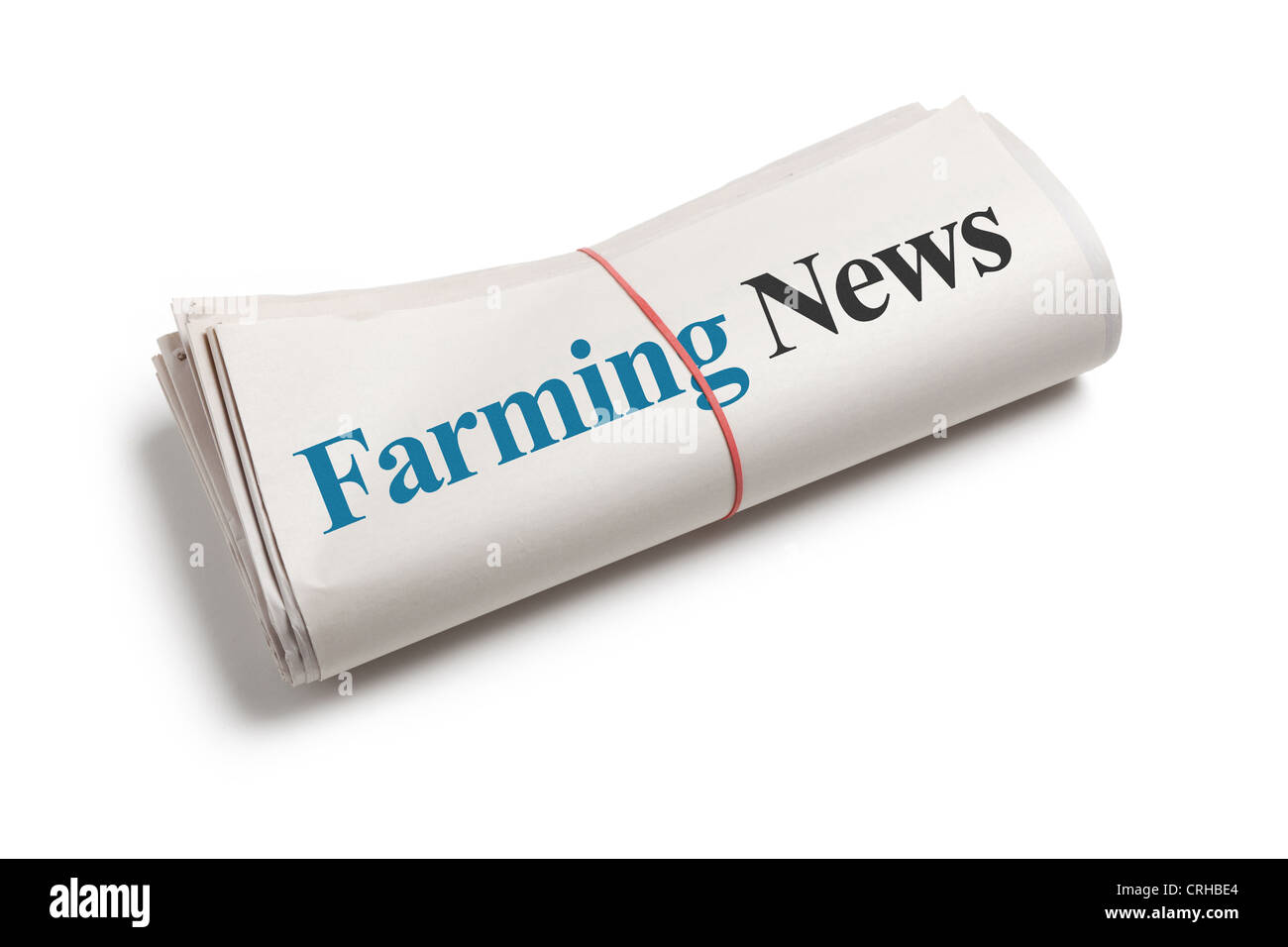 Agricoltura News, giornale rotolo con sfondo bianco Foto Stock