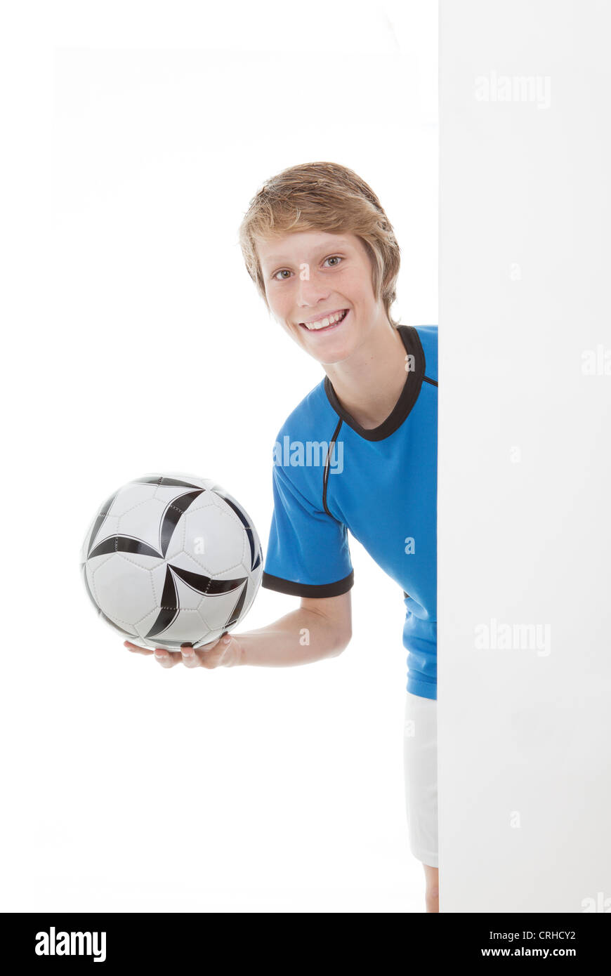 Ragazzo giocatore di calcio con il calcio Foto Stock