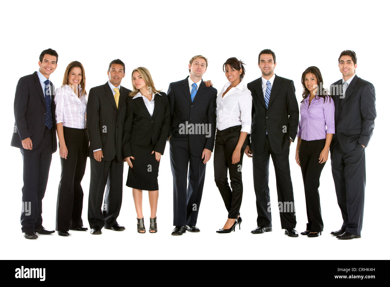 Un folto gruppo di imprenditori sorridente in piedi a fianco a fianco Foto Stock