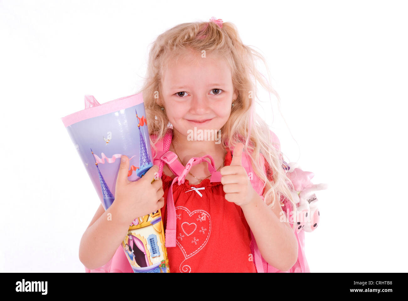 Prima della livellatrice con First-Day-scuola-cornet con il pollice in alto Foto Stock