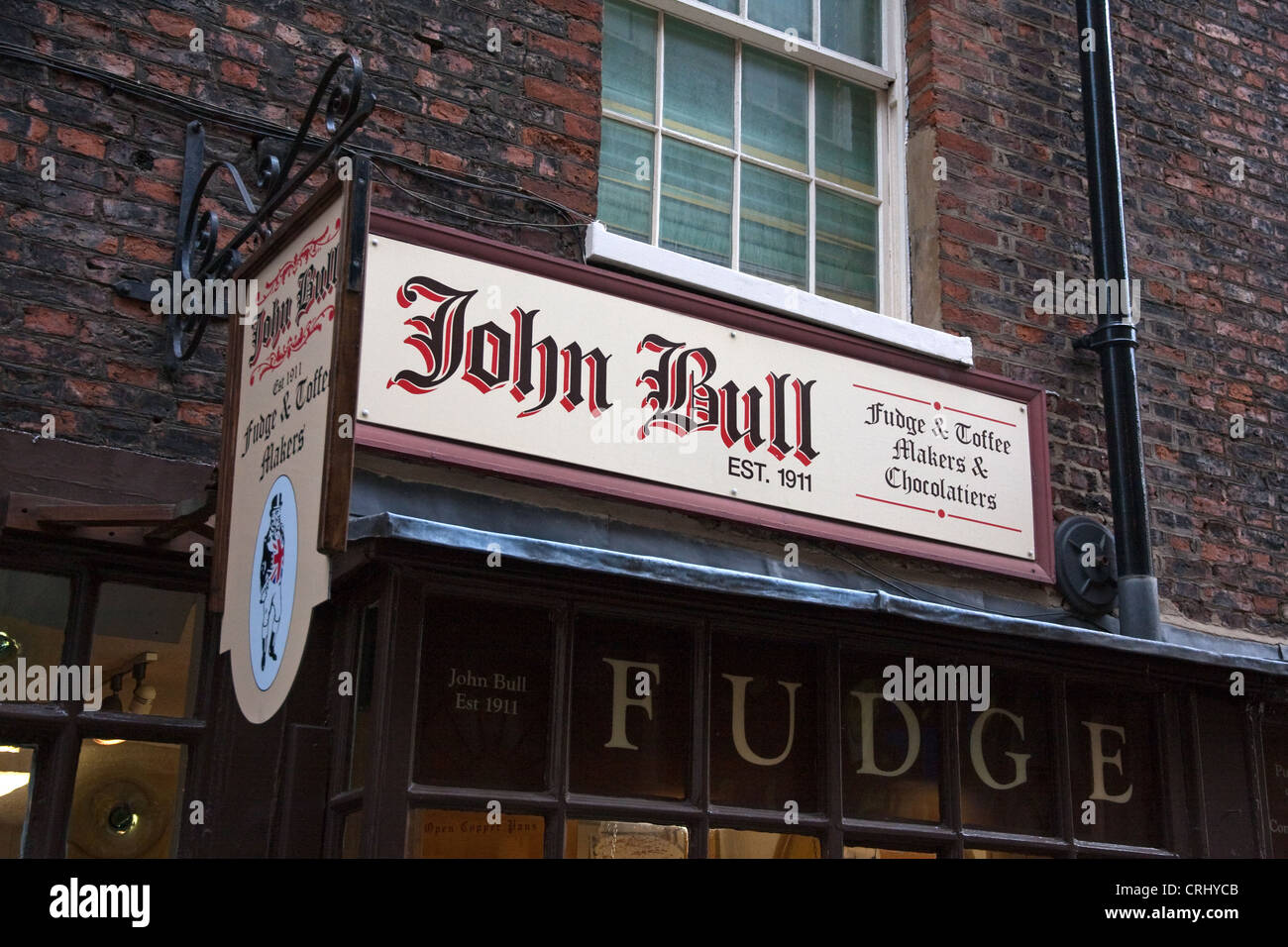 Segno su John Bull Fudge shop, York Foto Stock