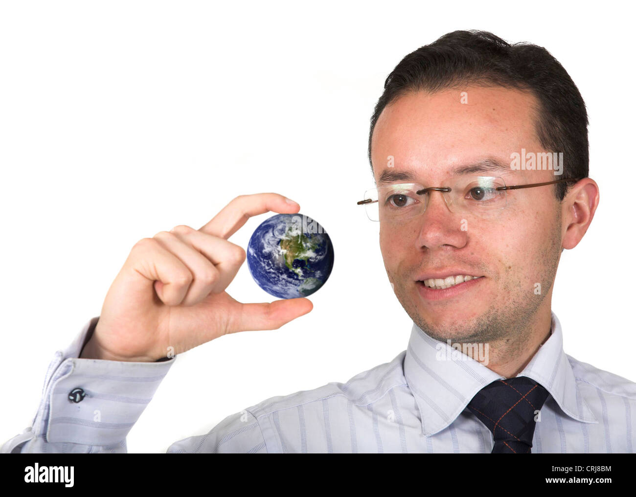 Business man holding globe Foto Stock