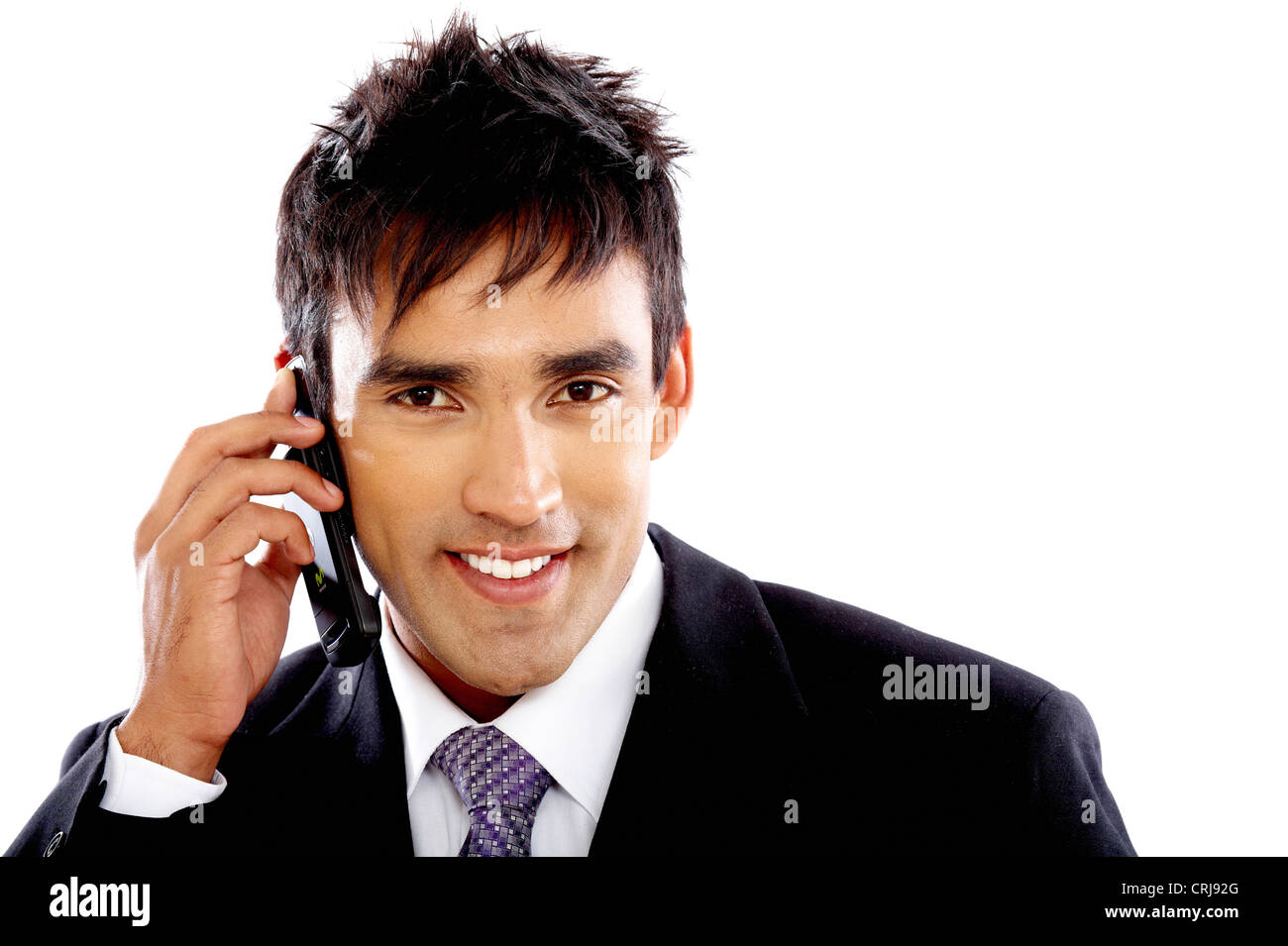 Uomo d affari al telefono con un grave aspetto Foto Stock