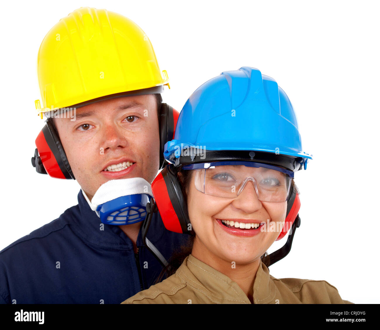 Paio di lavoratori manuali con Helms, occhiali di sicurezza, protezioni auricolari e maschera Foto Stock
