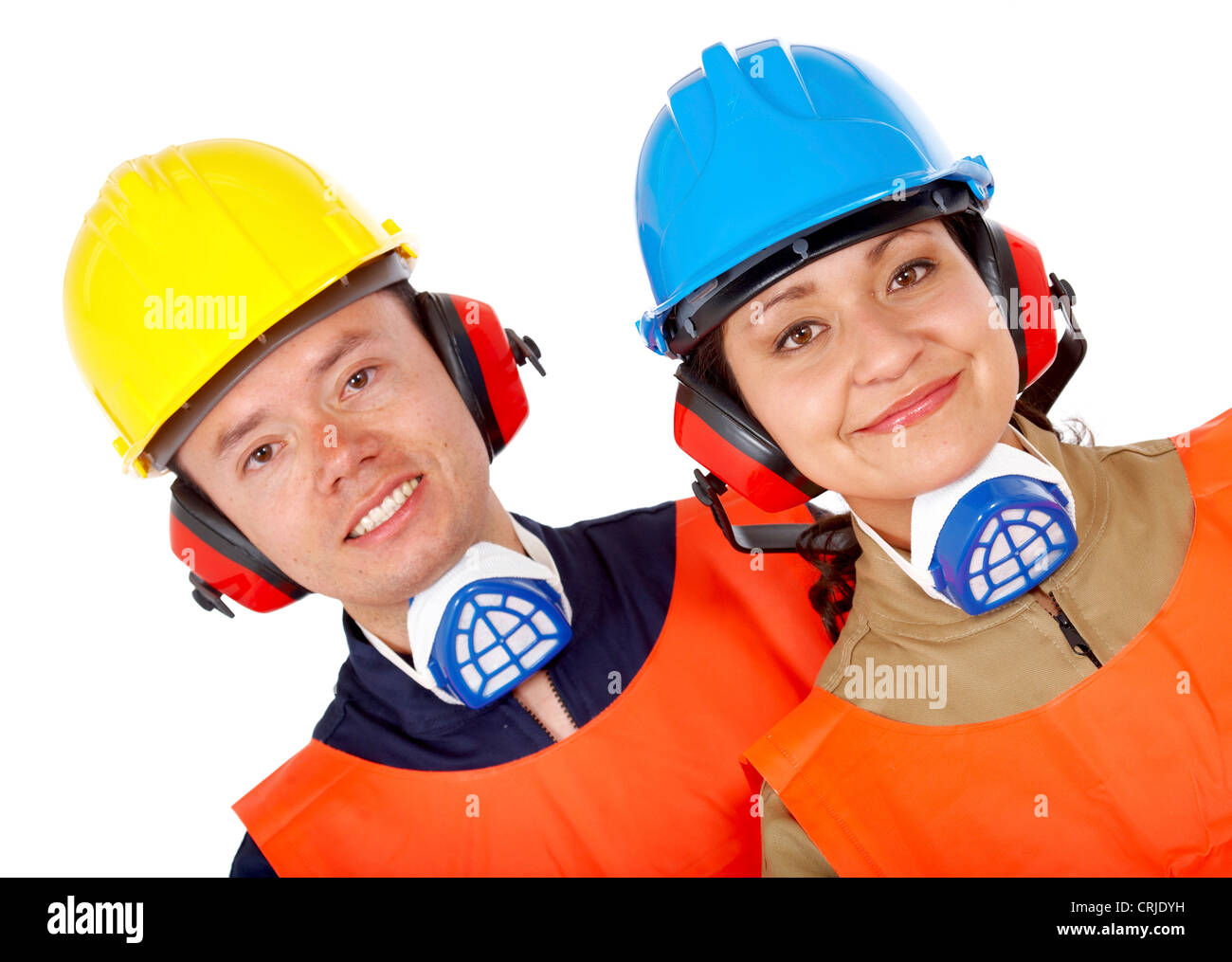 Paio di lavoratori manuali con Helms, protezioni auricolari e maschera Foto Stock