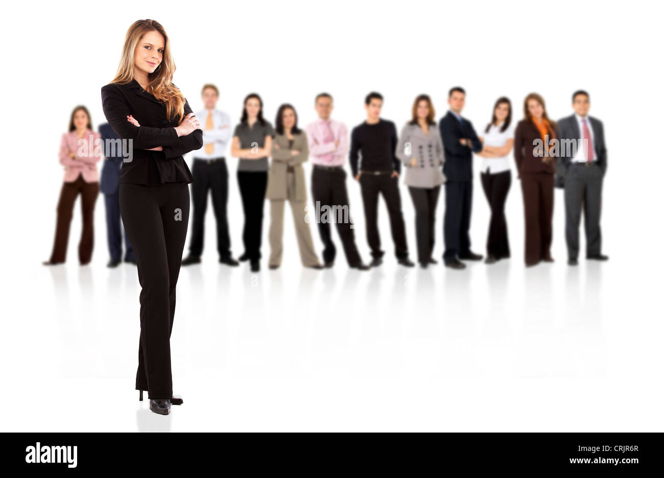 La gente di affari con una imprenditrice in piedi di fronte ad un gruppo isolato Foto Stock