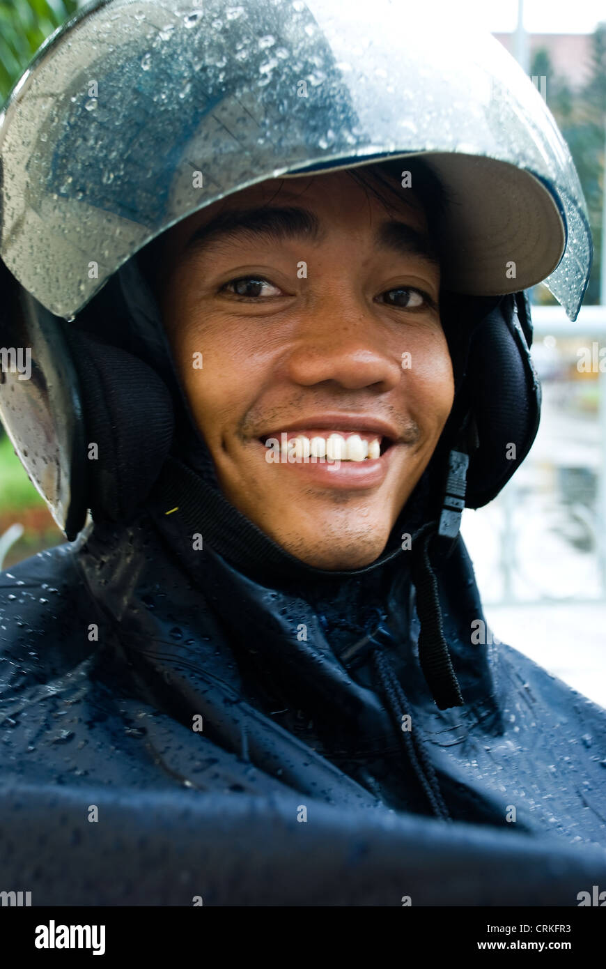 Il Vietnam di Ho chi minh city ciclista motore Foto Stock