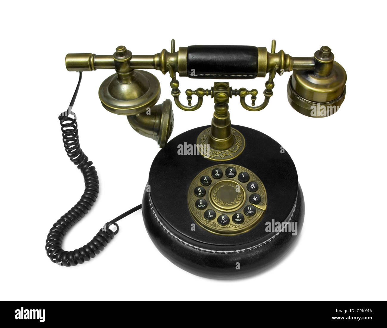 Il vecchio stile telefono in ottone e cuoio isolato su bianco Foto Stock