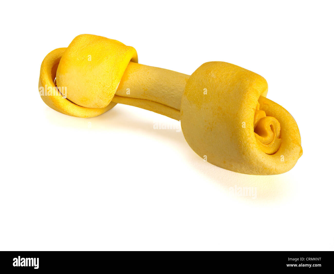 Una forma di osso prodotto da masticare per cani Foto Stock