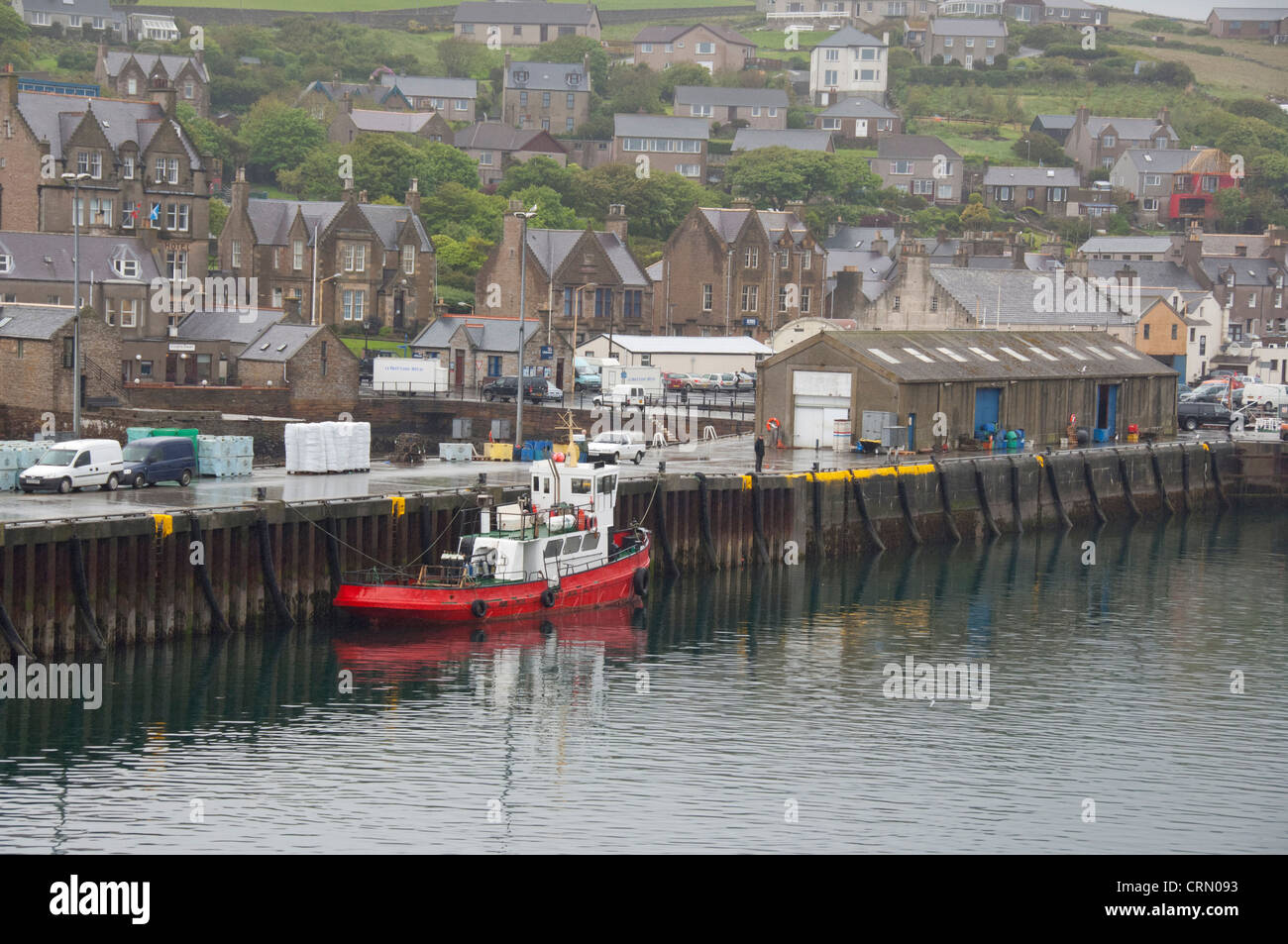 La Scozia, isole Orcadi, Continentale. La città capitale di Stromness. Area del Porto con il centro di dock. Foto Stock