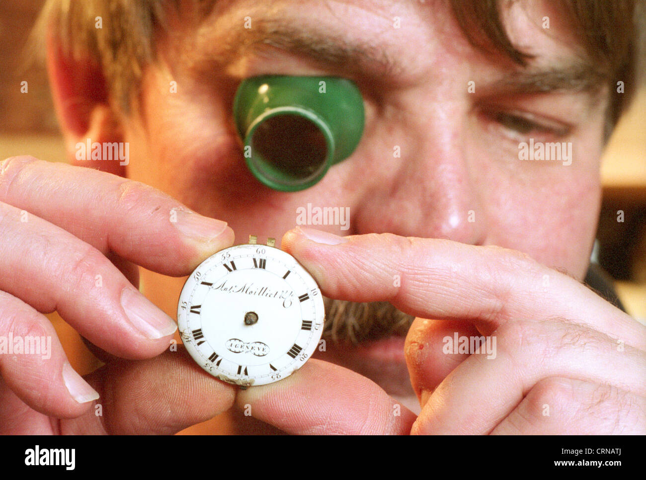 Orologiai magnifier controlla il movimento, Berlino Foto Stock