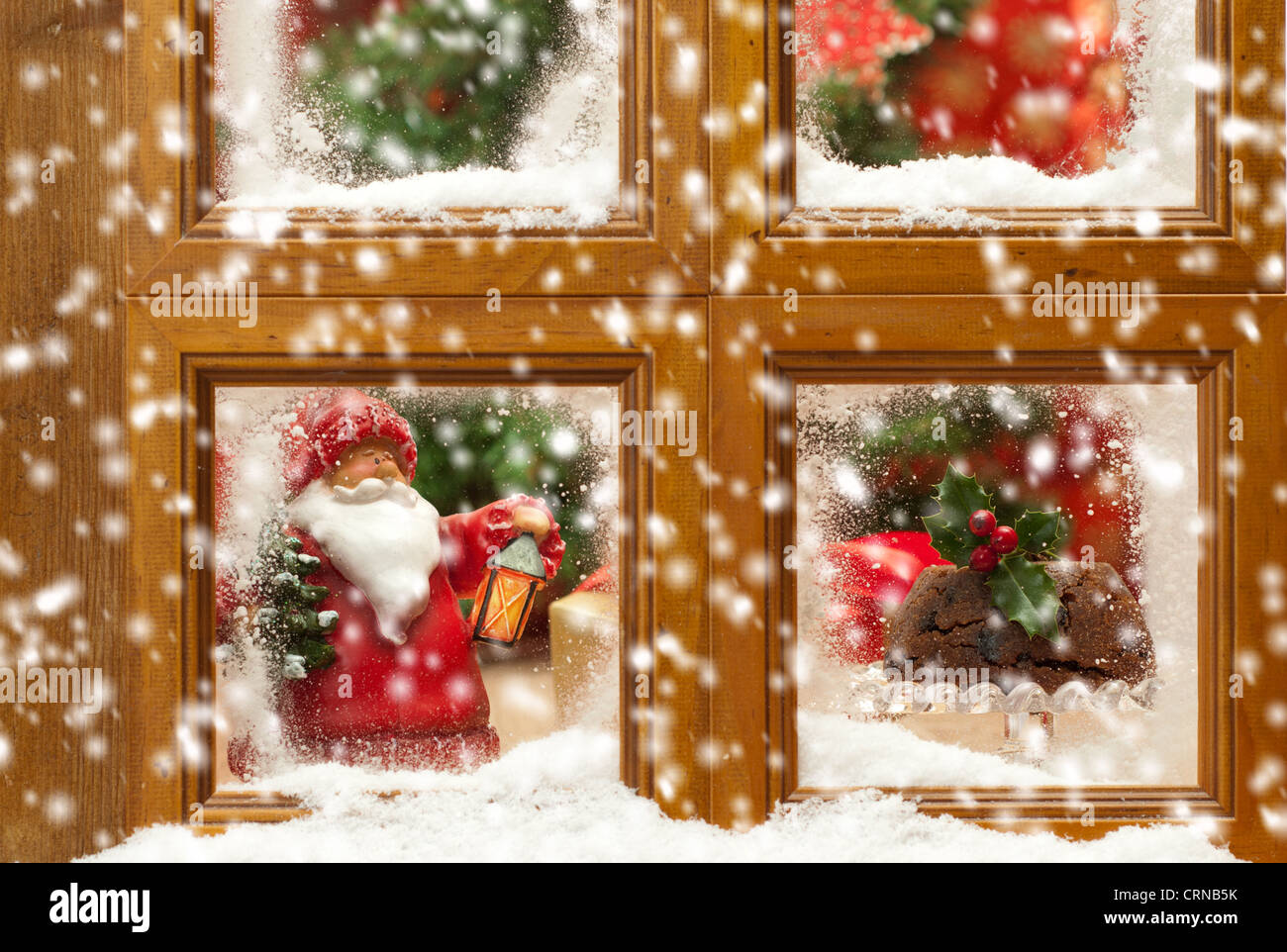 Immagini Contro Il Natale.Caduta Di Neve Contro Una Festa Di Natale Il Pupazzo Di Neve La Scena Della Finestra Foto Stock Alamy