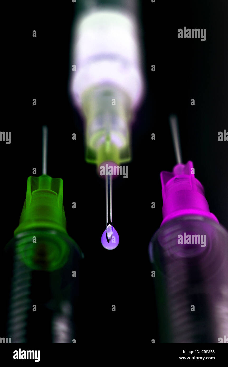 Una raccolta di siringhe. Foto Stock