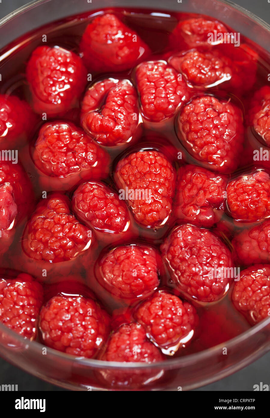 Lamponi in succo di frutta Foto Stock