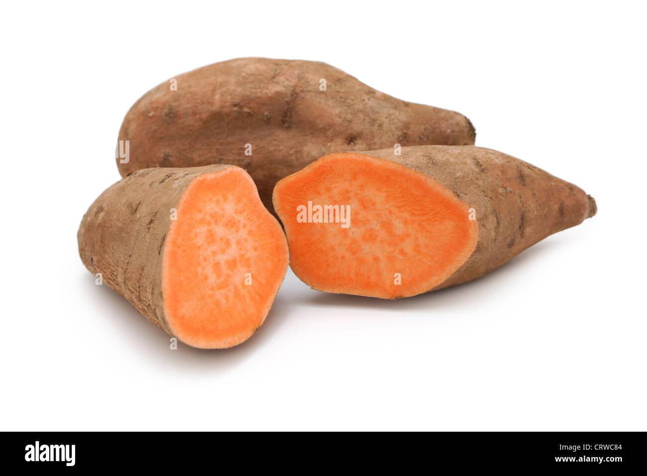 La patata dolce, patate dolci, igname, patate, arancione con la polpa esposta Foto Stock