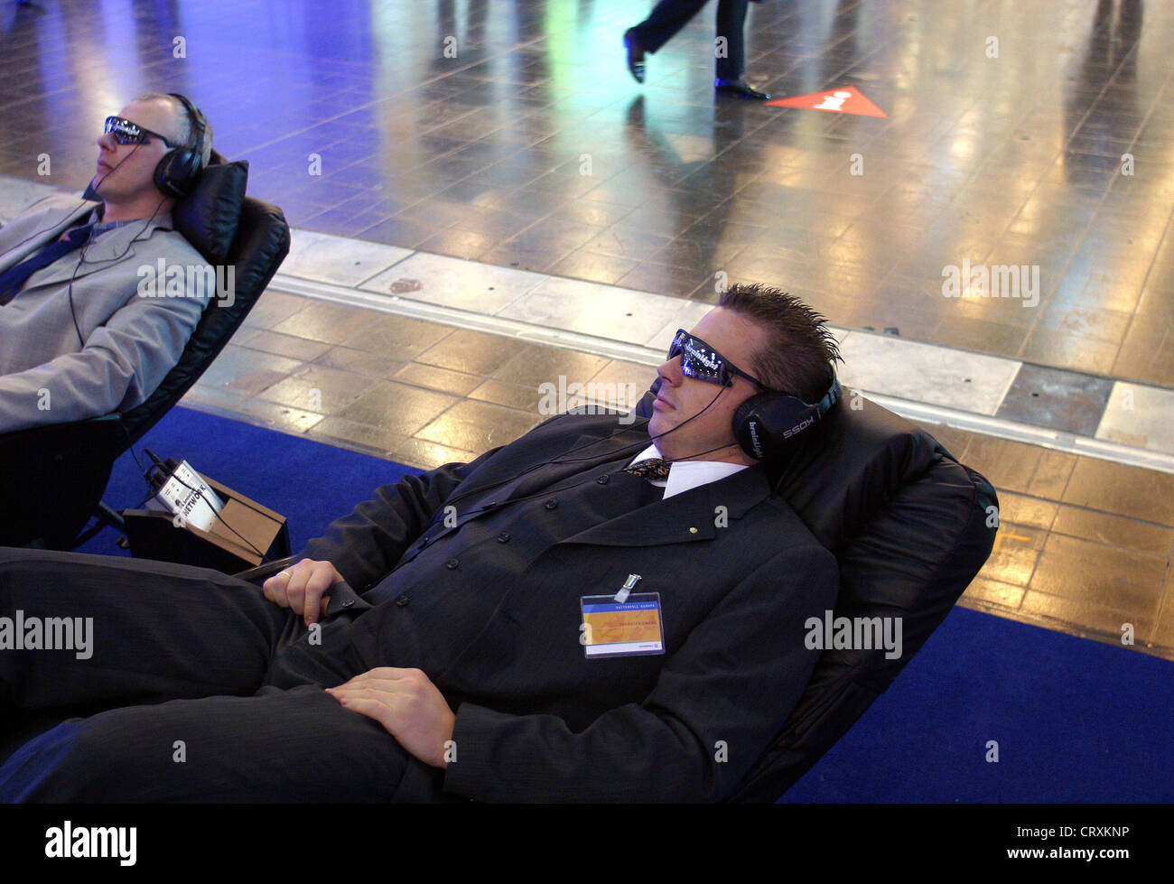 Manager relax sull'e-fiera mondiale di Essen Foto Stock