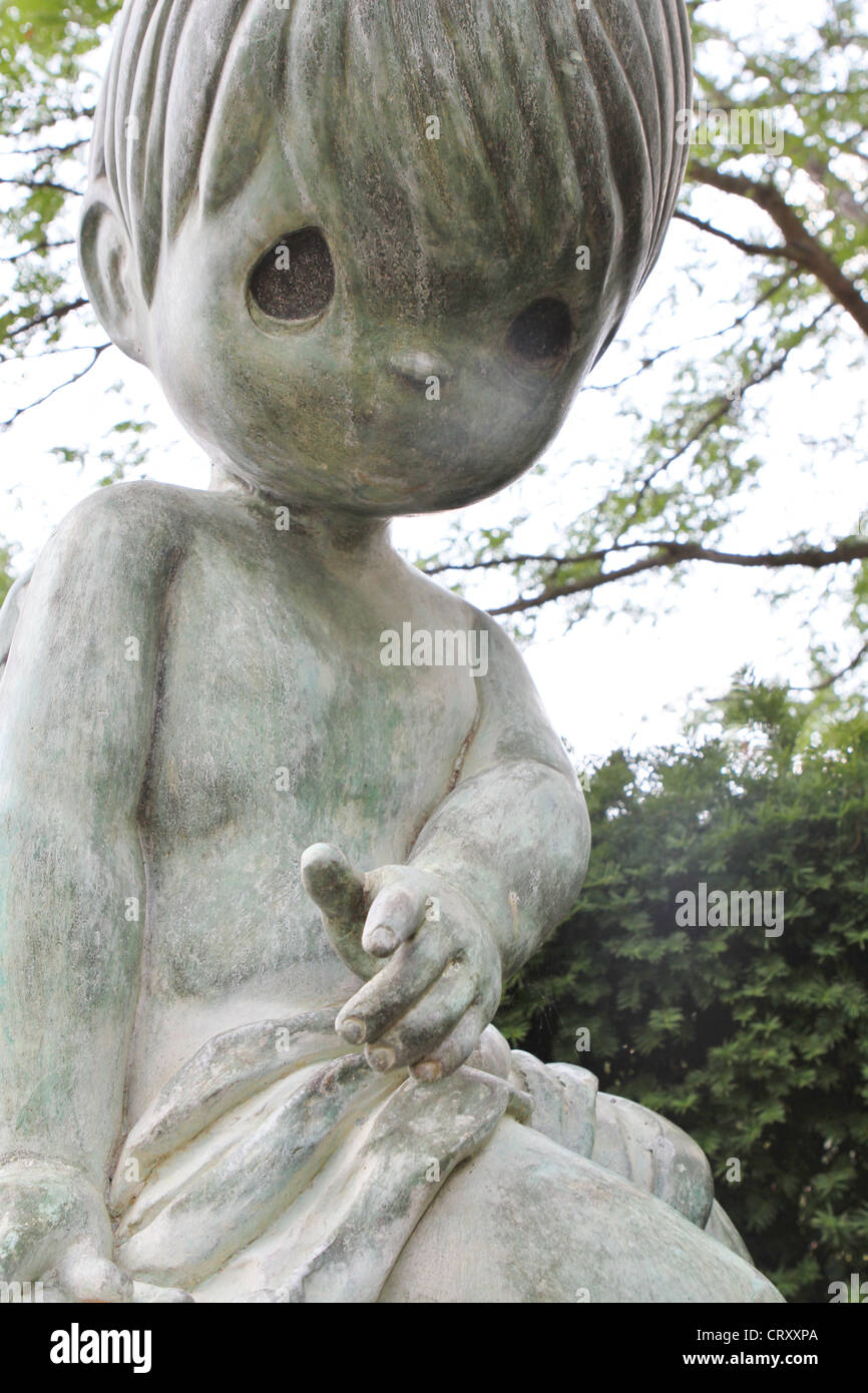 Una statua di un bambino a momenti preziosi Cappella di Cartagine, Missouri. Foto Stock