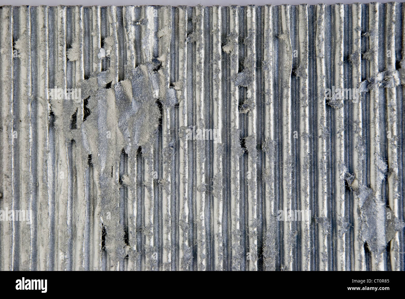 Parete con finitura in metallo su di esso. Sfondo metallico. Foto Stock