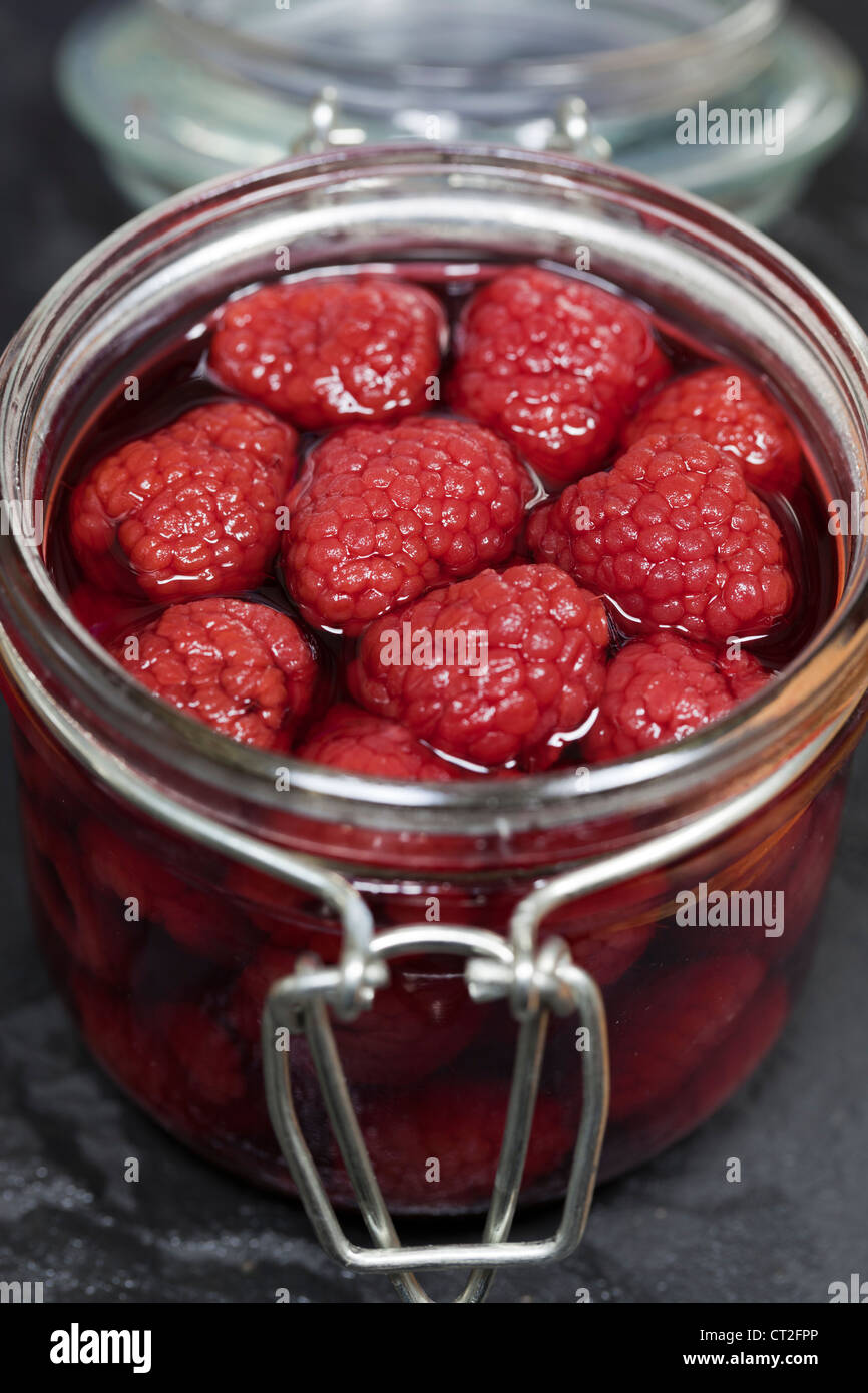 Lamponi in vetro vaso di storage Foto Stock