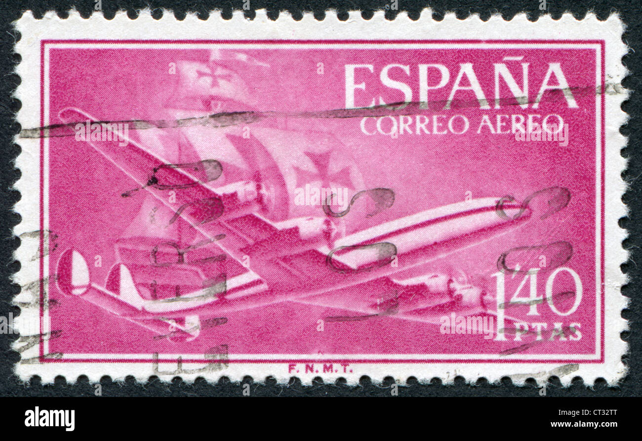 Spagna-CIRCA 1955: un timbro stampato in Spagna, il servizio postale mostra il velivolo Lockheed L-1049, circa 1955 Foto Stock