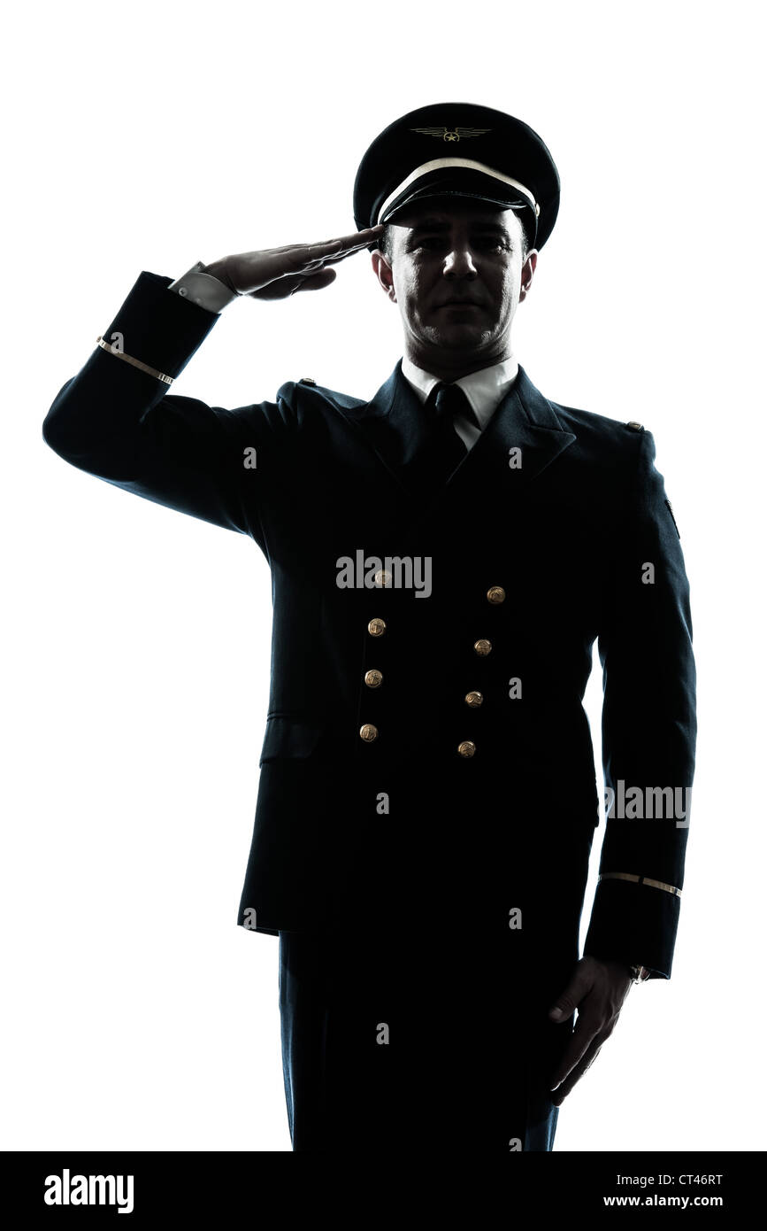 Un uomo caucasico in compagnia aerea uniforme pilota salutando silhouette in studio isolato su sfondo bianco Foto Stock